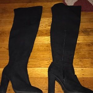 Knee high heeled boots